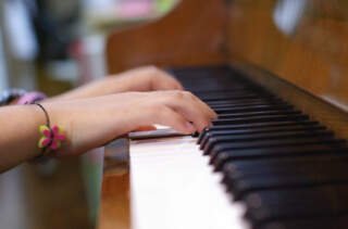 How Piano Lessons Enhance Cognitive Development in Children?